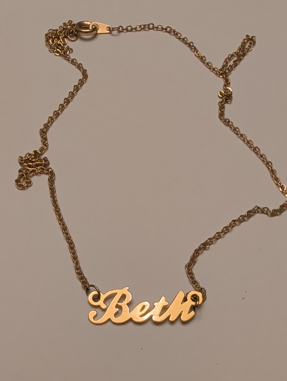 Personalized 'Beth' Name Necklace - Gold Tone Script Pendant